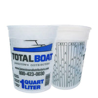 Measurement cup with Total Boat branding and measurement markings on a white background