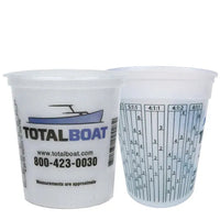 Two plastic measuring cups with 'Total Boat' branding and measurement scale on a white background