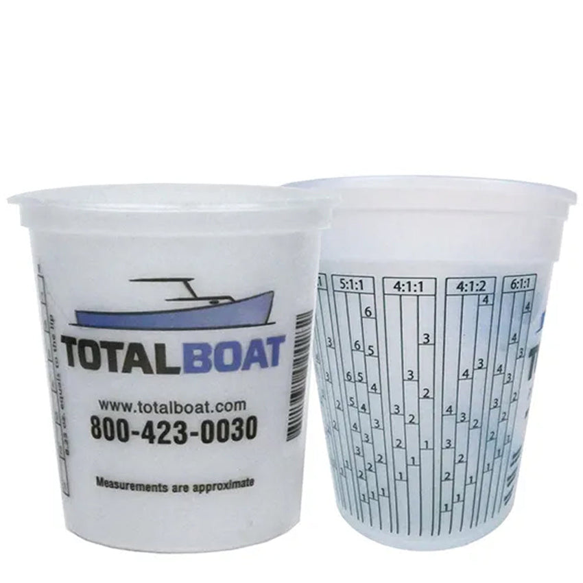 Two plastic measuring cups with 'Total Boat' branding and measurement scale on a white background