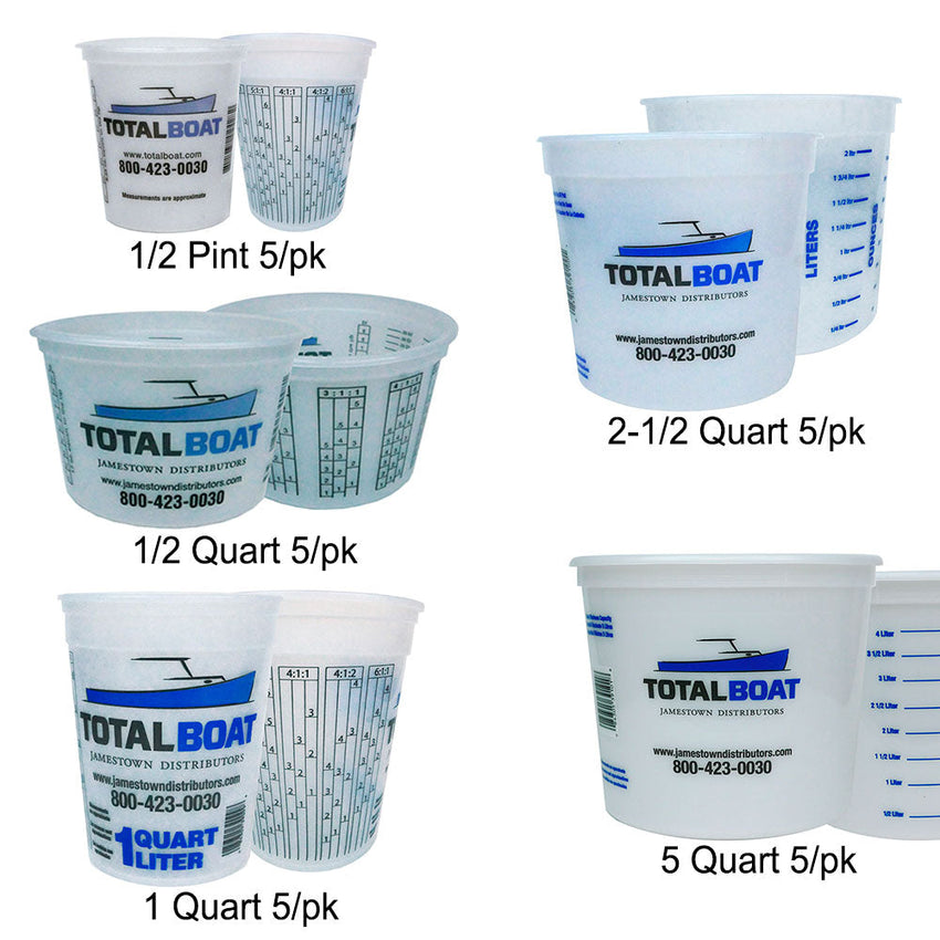 Collection of Total Boat branded plastic measuring cups in various sizes on a white background.