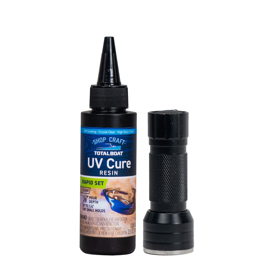 Clear UV Epoxy and a UV flashlight in a kit for filling holes, art pieces, woodworking, and epoxy projects.